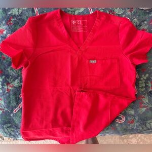 Figs one pocket Catrina top in neon red